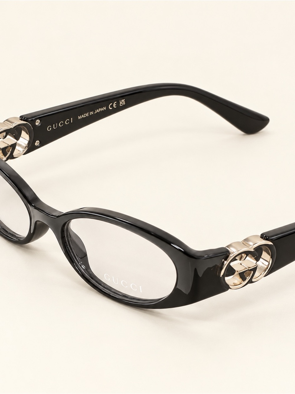 Gucci Black Oval Women's Glasses with Gold Interlocking G Accents
